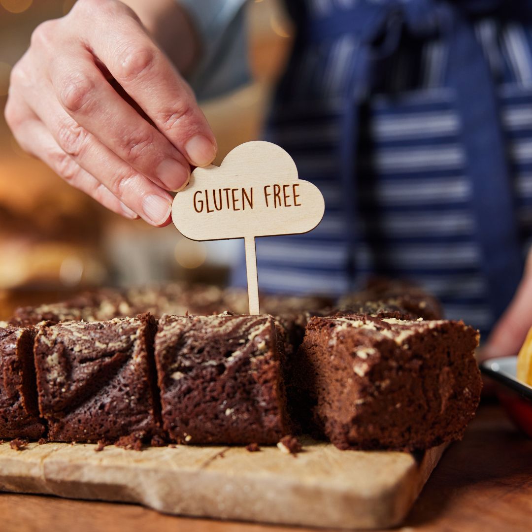 Gluten free brownies with a sign showing they are gluten free Gluten free brownies with a sign showing they are gluten free
