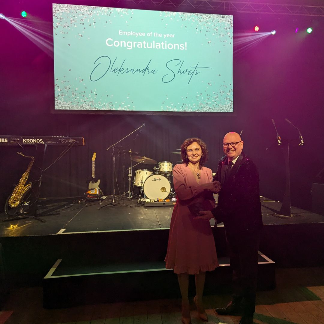 Oleksandra Shvets receiving her award with Jon Marlow Oleksandra Shvets receiving her award with Jon Marlow