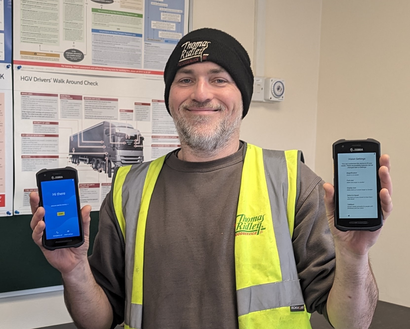 Image of Rob Poulton showing the new podfather system on two mobile phones Image of Rob Poulton showing the new podfather system on two mobile phones