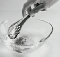 Step 3 of basic spherification Step 3 of basic spherification